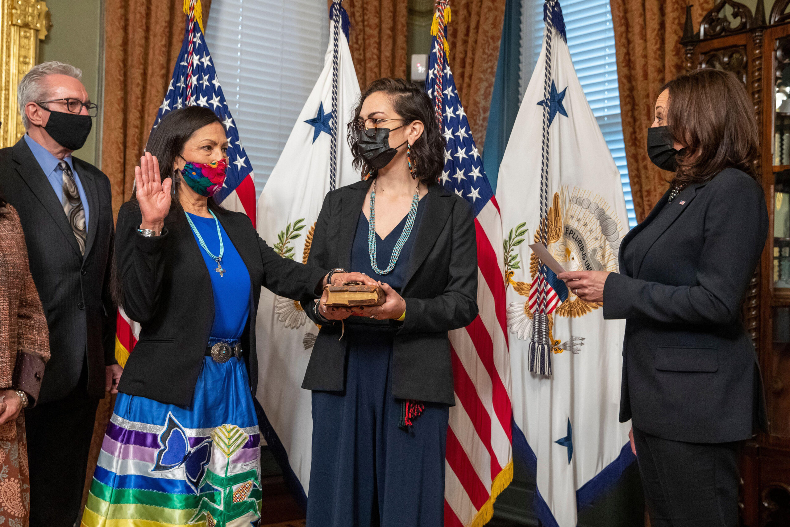 Ceremonial swearing in of Debra Haaland (2-L), with her daughter Somah Haaland (2-R)